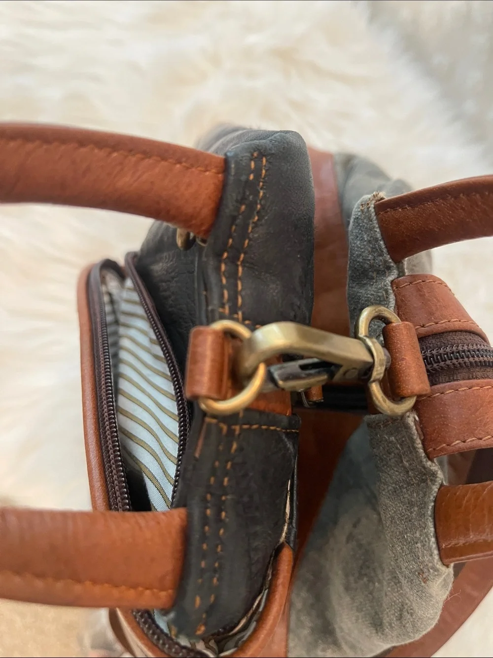 Black Leather Backpack with Brown Trim and Brass Accents